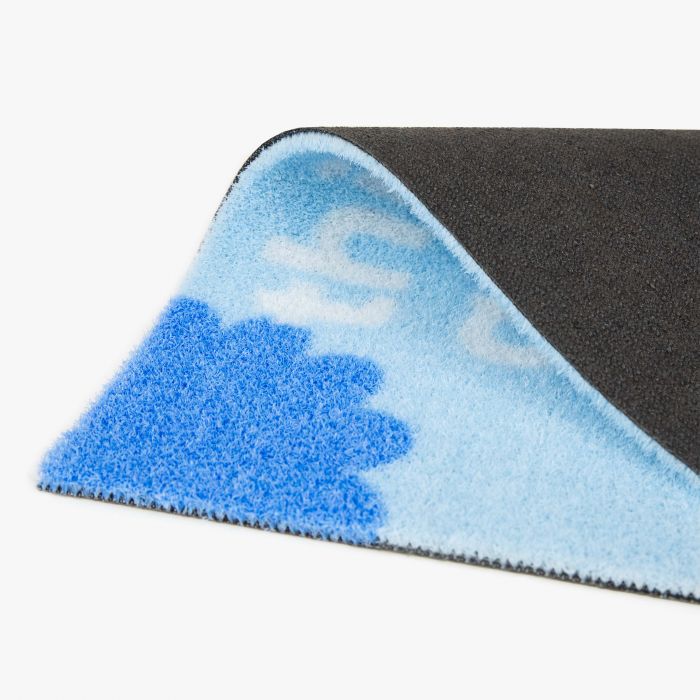 Detail van de anti-slip structuur aan de achterzijde van de outdoor vloermat