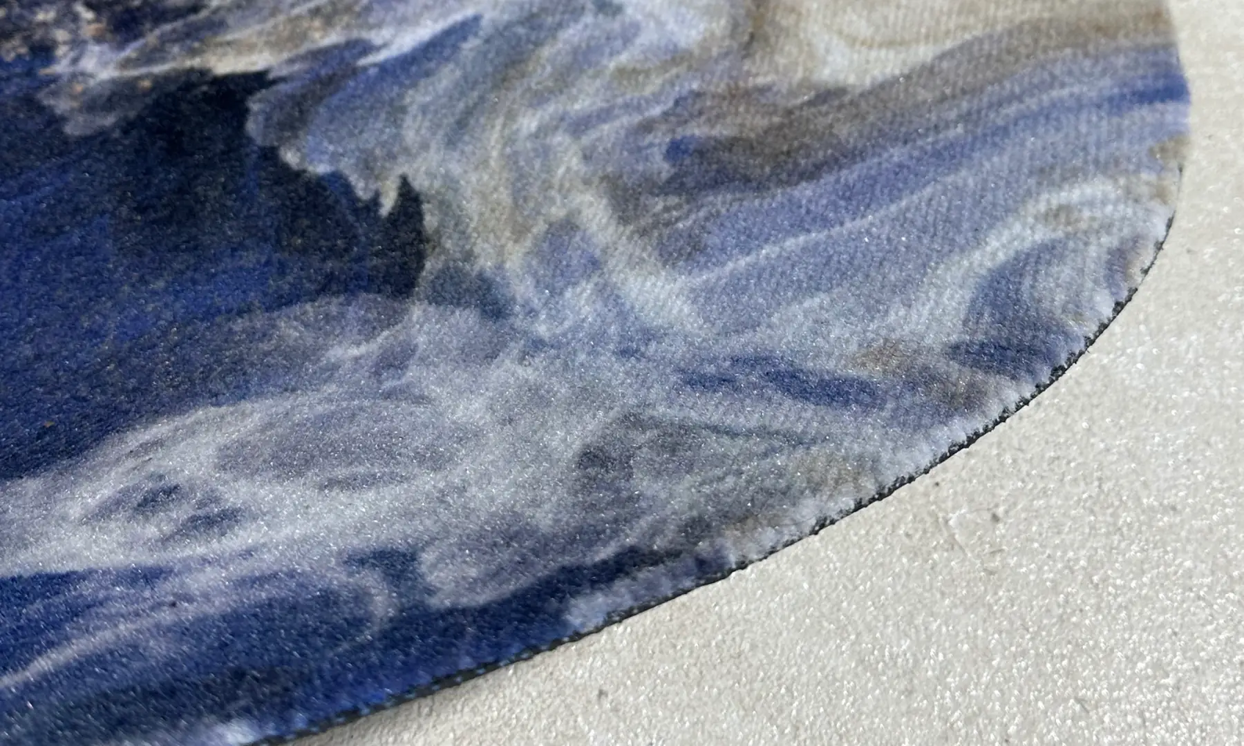 Ronde schoonloopmat met blauwe marmerprint